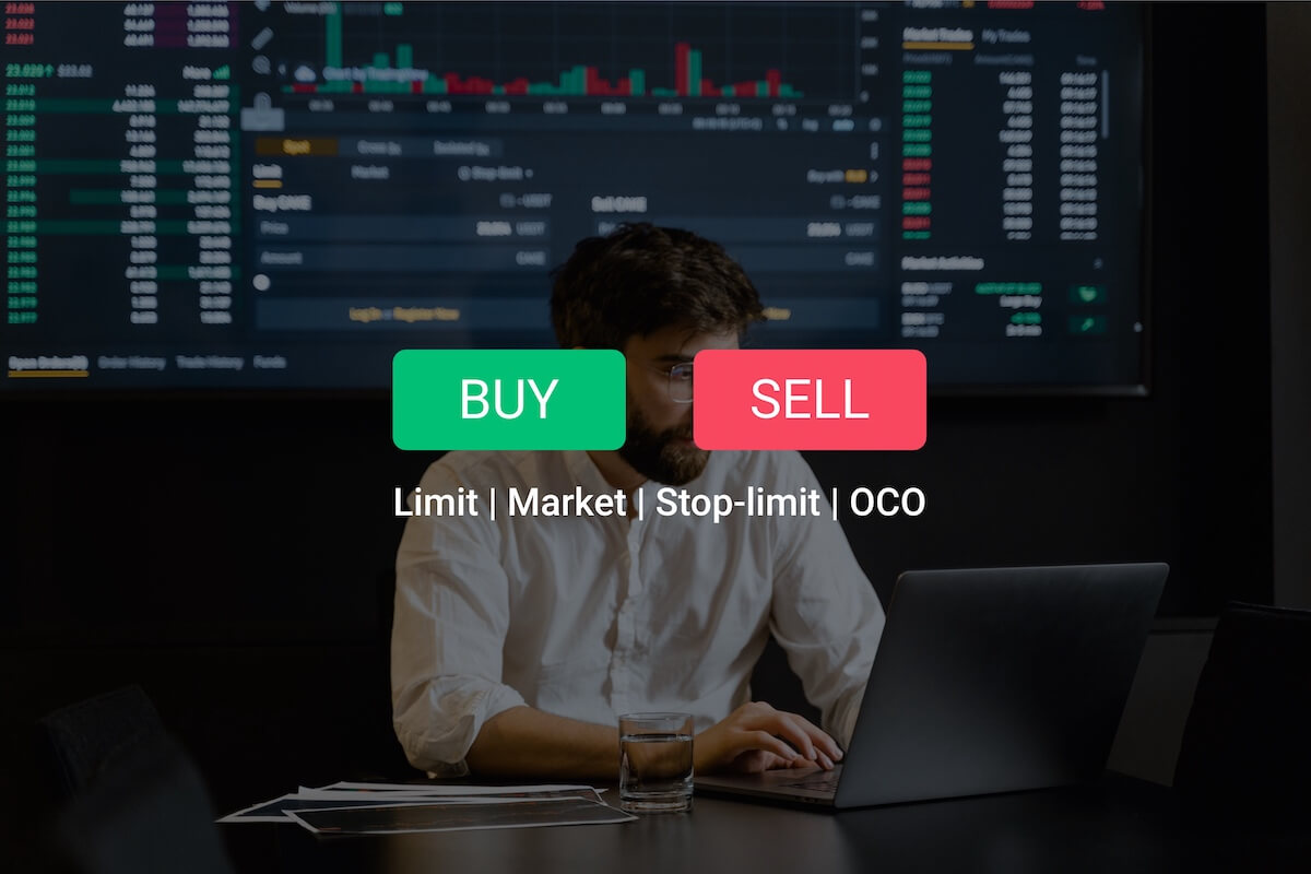 A man is traiding cryptocurrency with computer